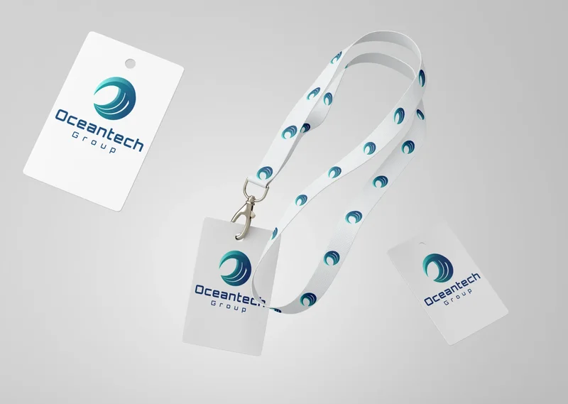 Lanyard with a repeating wave pattern and Oceantech Group ID cards