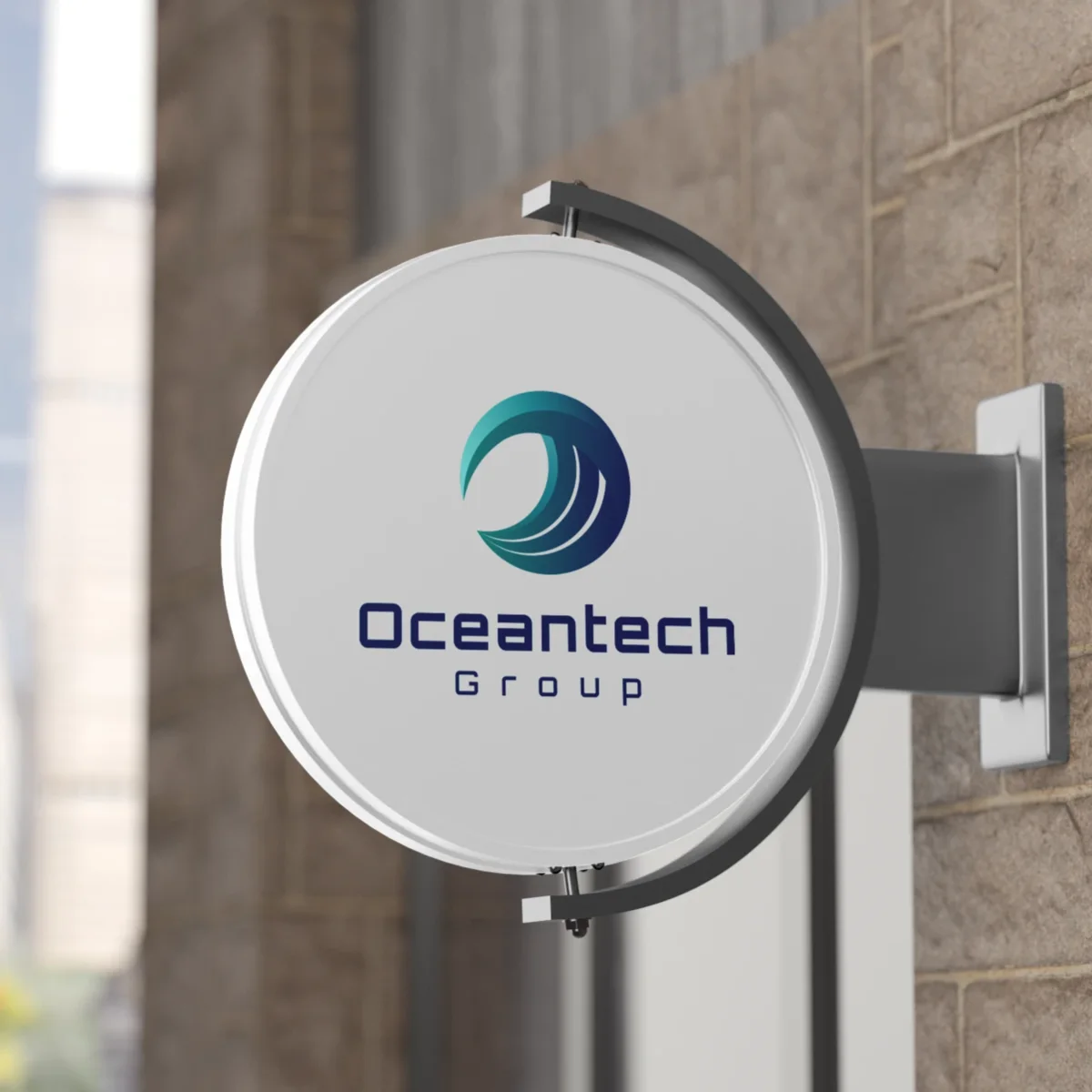 Round wall sign with the Oceantech Group logo